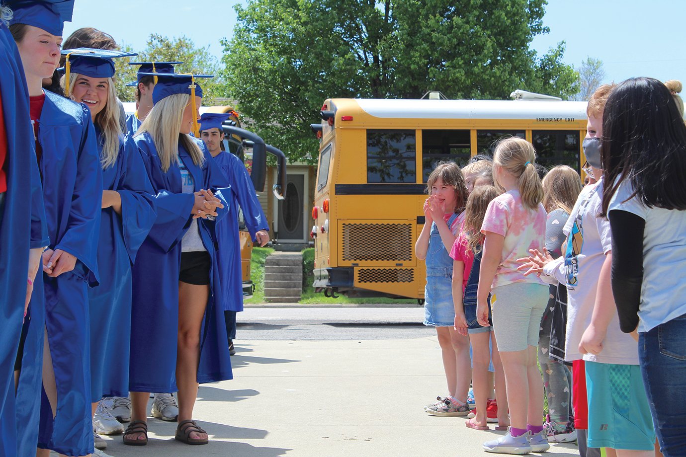 Crawfordsville seniors line up alongside their elementary counterparts before marching through Hose.